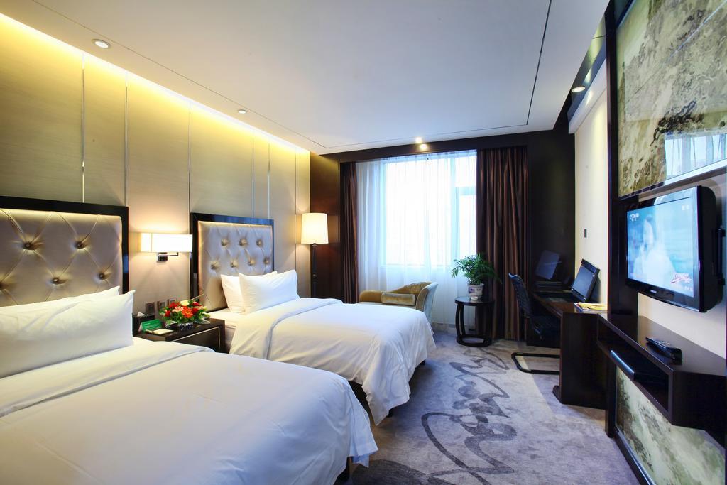 Xichang Minshan Hotel חדר תמונה
